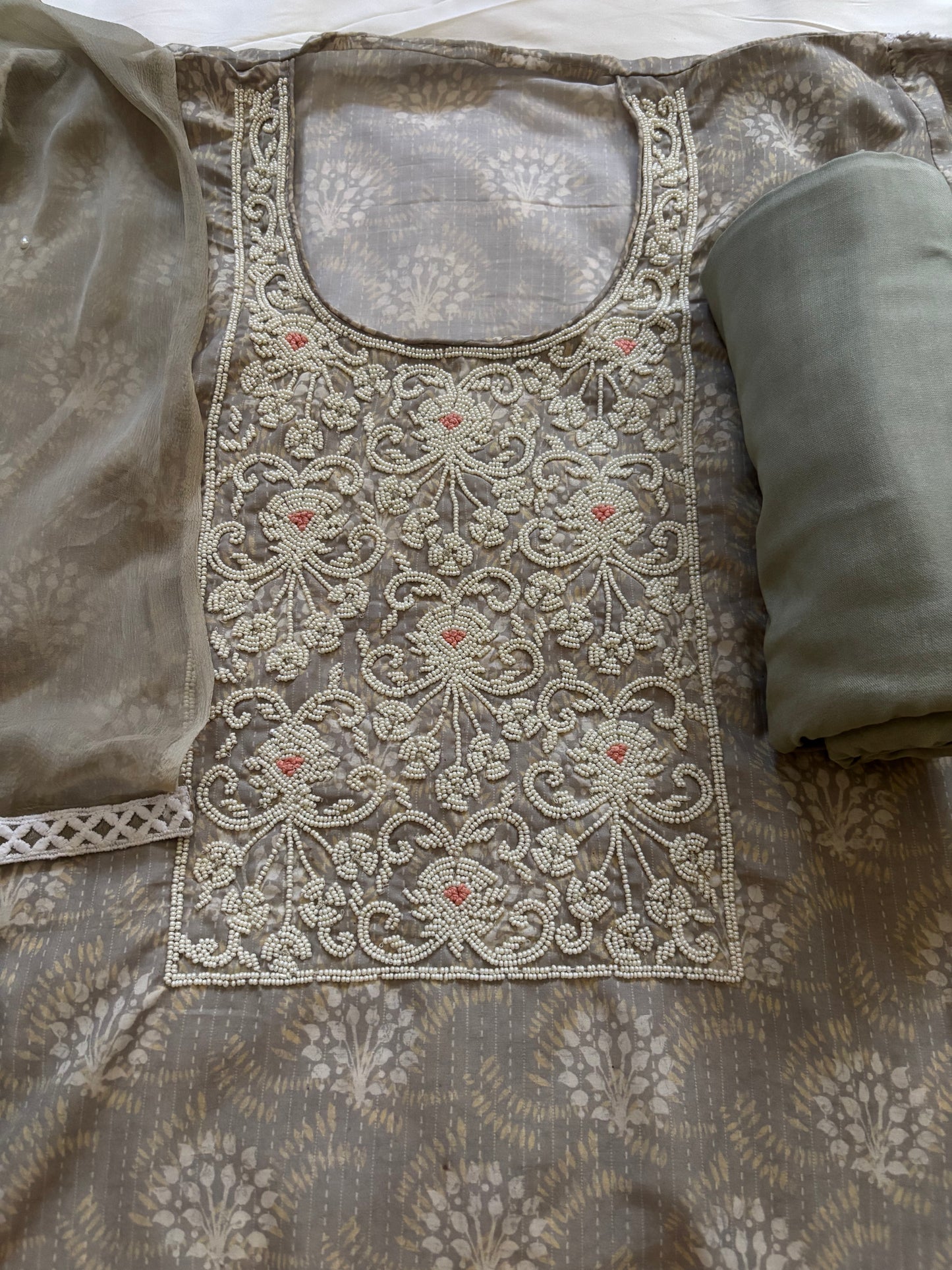 Grey pearlwork suit