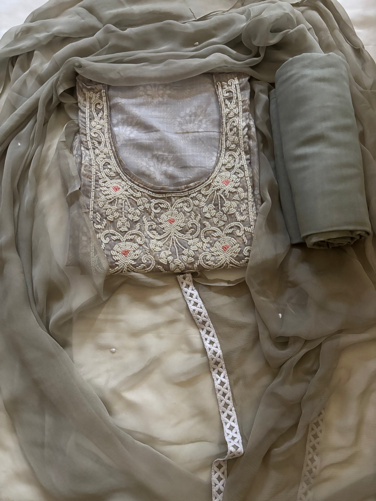 Grey pearlwork suit